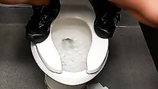Amateur squats on the toilet seat and urinates--_short_preview.mp4