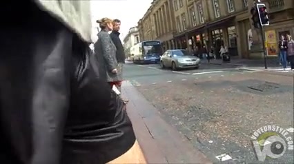 Bouncing dick in soft black shorts in public