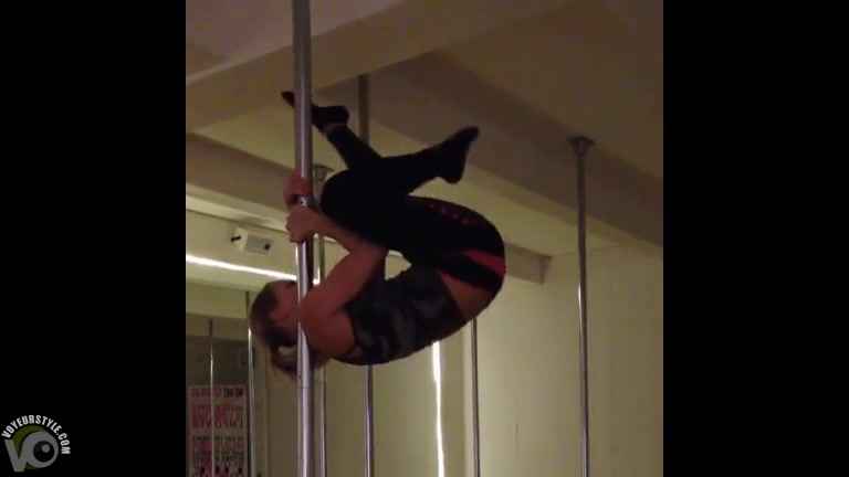Blonde sweetheart practices her pole skills