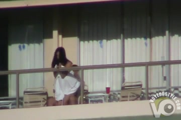 Couple has public sex on a hotel balcony