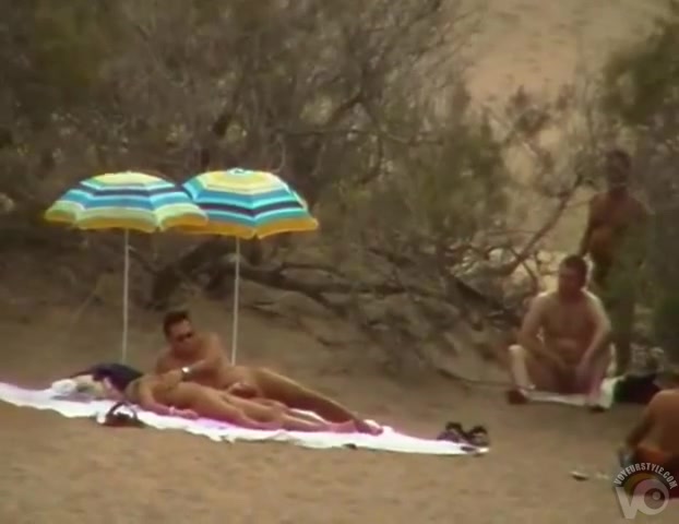 Hubby playing with her pussy in beach voyeur view