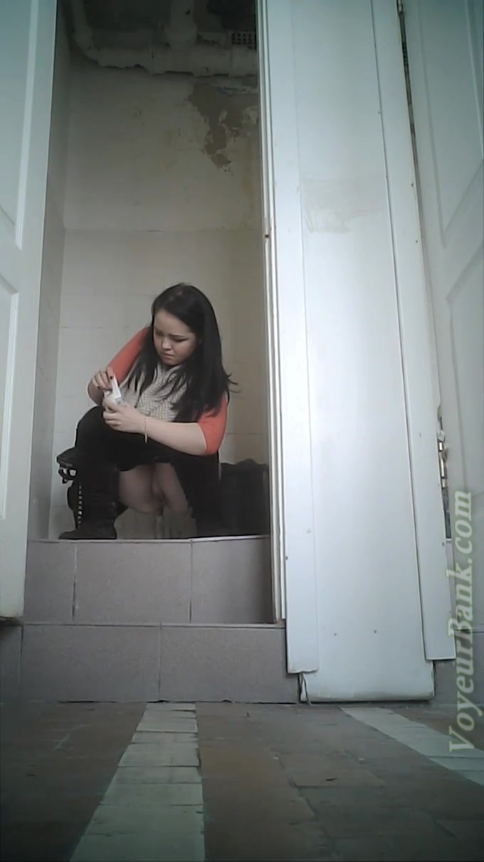 Chunky and cute brunette babe in tight jeans filmed in the toilet
