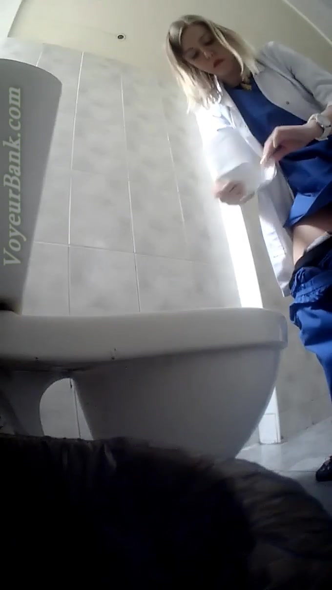 Lovely white smooth skin ass of a white girl in the toilet