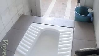 Redhead chick in green pants pisses in the public restroom--_short_preview.mp4