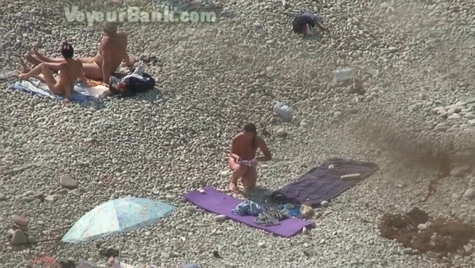 Blonde fine amateur white chick with gorgeous butt on the nudist beach