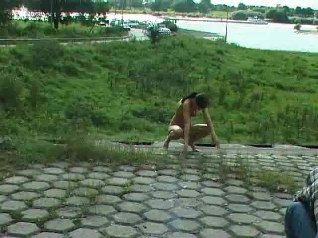 My skinny brunette lady strips outside and pisses in the park