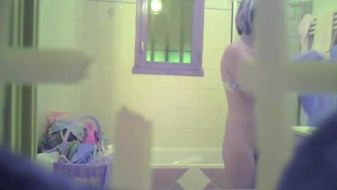 Spying on sexy blonde MILF in the bathroom