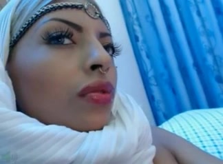 Exotic webcam Arab beauty in scarf was rubbing her juicy bald pussy