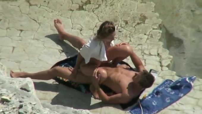 Sexy European girl is getting fucked hard on a beach in a missionary position