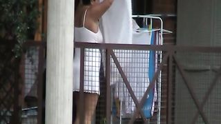 My buddy spied on his mature brunette neighbor wandering in her balcony--_short_preview.mp4
