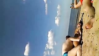 Friend gives his sassy girlfriend massage on the beach--_short_preview.mp4