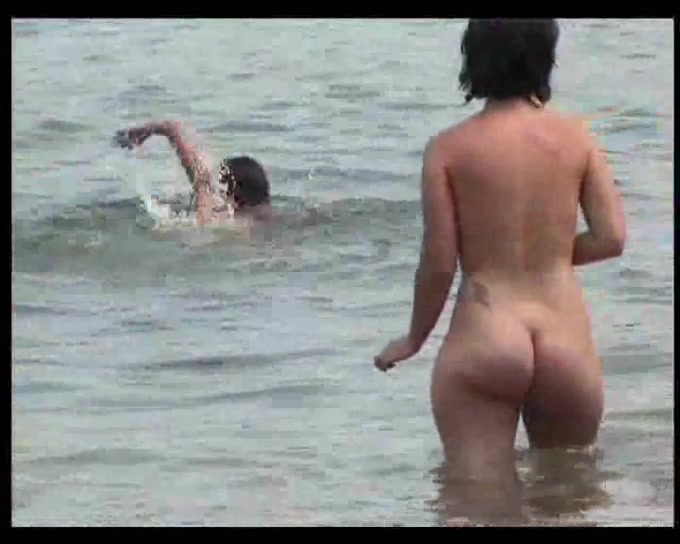 Two curvy Latina chicks expose their big asses on the nude beach