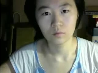 Asian serious or even dull looking webcam Asian whore exposed her tits