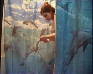 My lovely redhead GF takes a shower in homemade video
